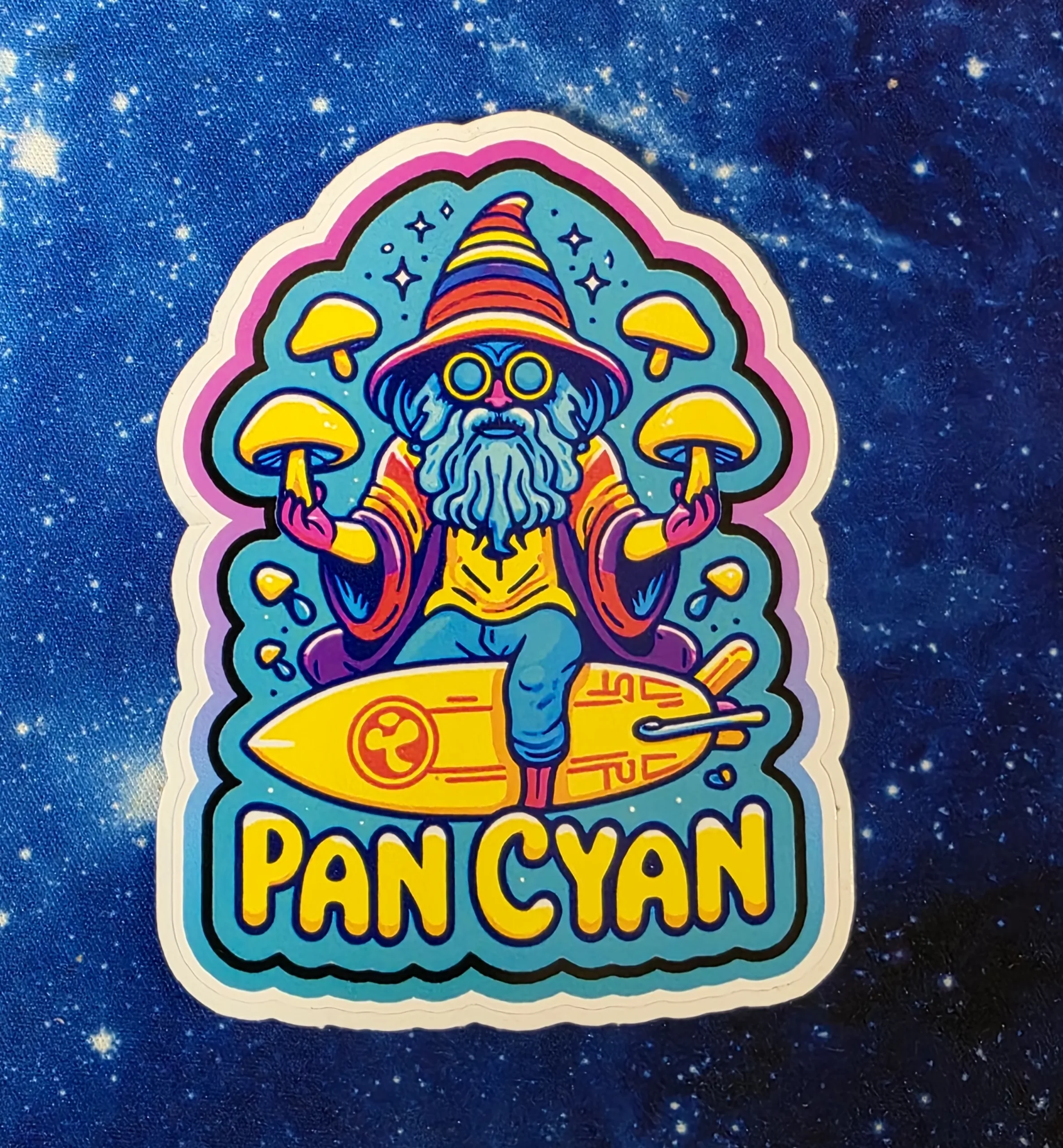 Pan Cyan surfing wizard mushroom vinyl sticker from Cube Culture USA